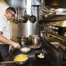 chef-cooking-in-a-restaurant-kitchen-2021-04-04-10-02-06-utc